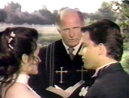 Photo:  Bob officiates at a soap wedding