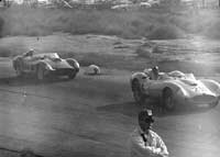Thumbnail: Richie Ginther leads Phil Hill into Turn 2, 1958