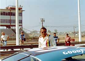 Thumbnail: David Pearson wearing sunglasses at an IROC, RIR